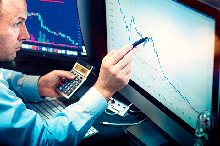 An investor following a stock chart. 