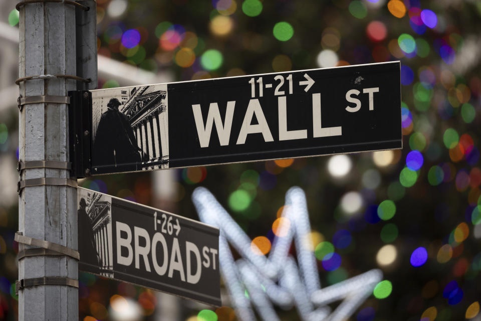 S sign at the intersection of Broad and Wall streets is shown outside the New York Stock Exchange, Monday, Dec. 11, 2023, in New York. Stocks drifted higher in afternoon trading Monday on Wall Street ahead of the Federal Reserve’s last meeting of the year. (AP Photo/Yuki Iwamura)