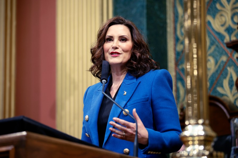 FILE - Michigan Gov. Gretchen Whitmer delivers her State of the State address to a joint session of the House and Senate, Jan. 25, 2023, at the state Capitol in Lansing, Mich. Whitmer will call for increased investments in education through initiatives such as free community college for all high school graduates and free preschool for 4-year-olds in a State of the State speech Wednesday, Jan. 24, 2024, focused on cutting costs for residents. (AP Photo/Al Goldis, File)