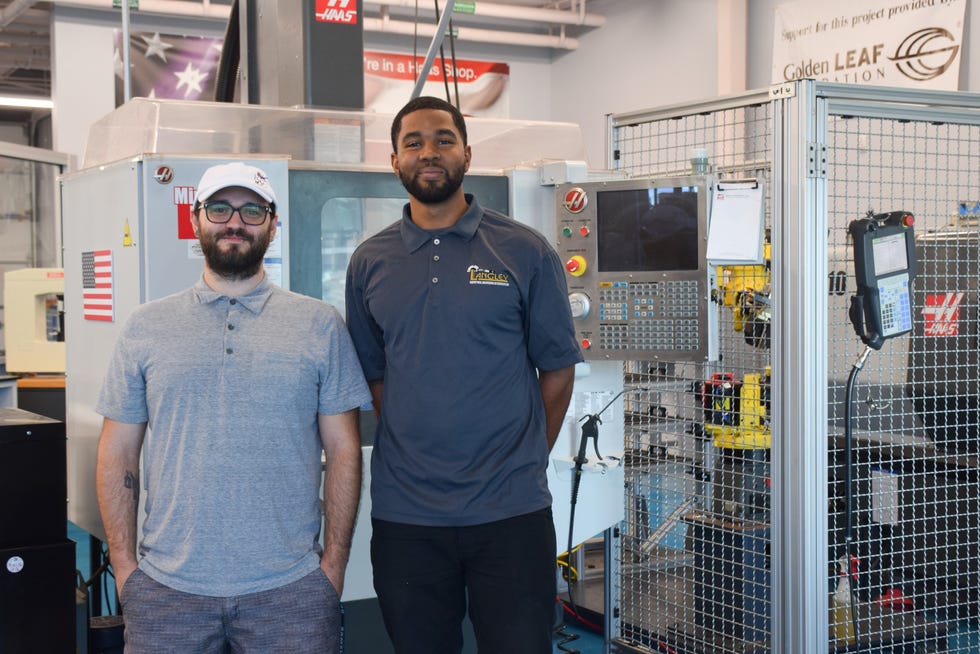 Troy Chappell (left) and Deven Scoggins in the advanced manufacturing lab at Nash Community College in Rocky Mount, North Carolina.