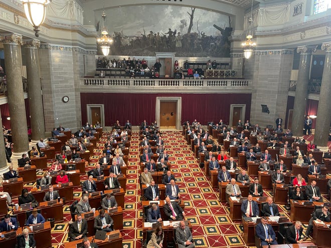 Members of the Missouri House of Representatives gather for the start of the legislative session in Jefferson City on Jan. 3, 2024.