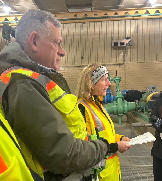 Russ Reeves and Troy Mayor Carmella Mantello speak at the Eddy's Lane Pump Station a few weeks ago. (Photo provided/File)