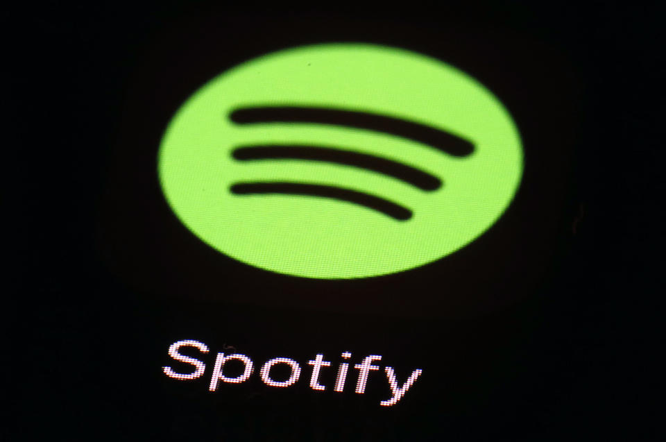 Spotify is set to report its fiscal fourth quarter earnings on Tuesday before the bell as the music streaming platform continues to focus on profitability amid more changes to its podcasting strategy. (AP Photo/Patrick Semansky, File)