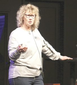 Karla Wagner, founder of the AxMITax proposal, speaks at Lifesong Church in Snover on Tuesday, Feb. 20. Photo by Casey Johnson