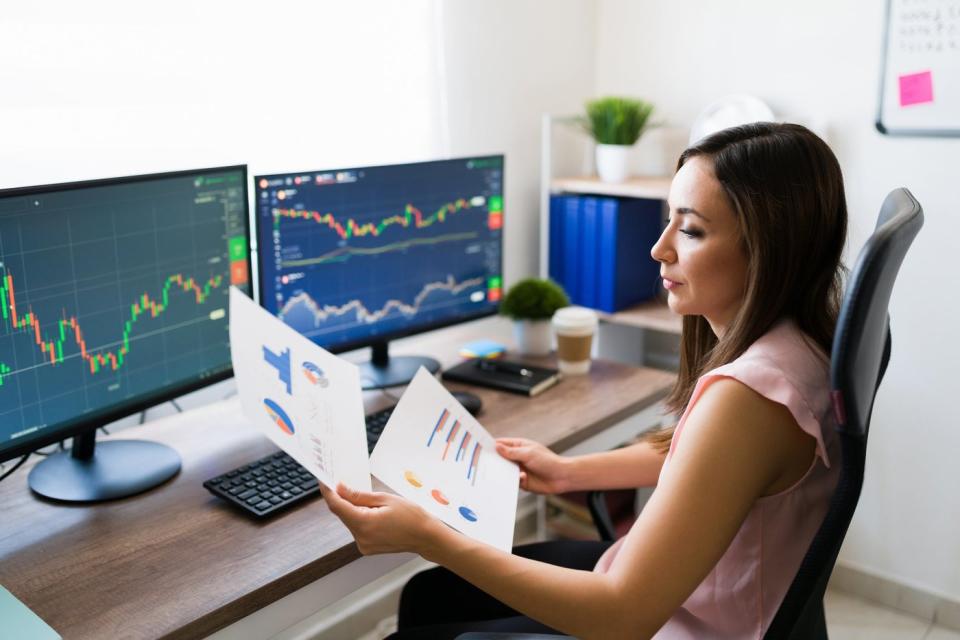 Individual investor analyzing stock charts.