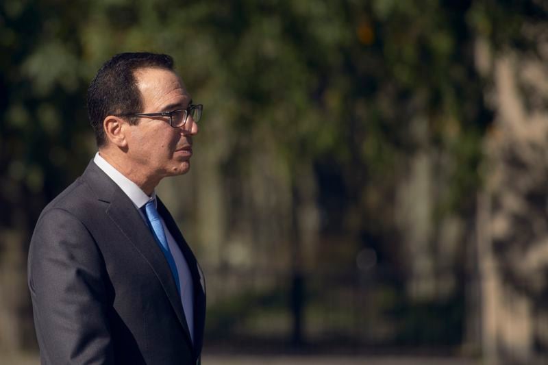 FILE - Former Treasury Secretary Steven Mnuchin leaves Federal Court after testifying in Tom Barrack's trial, Oct. 20, 2022, in the Brooklyn borough of New York. Mnuchin is now interested in buying TikTok, just days after his investment firm led a $1 billion deal to inject life into a beaten-down bank. (AP Photo/Andres Kudacki, File)