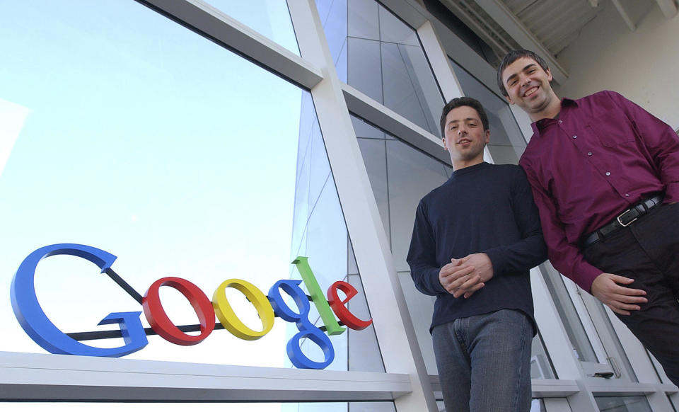 FILE - Google co-founders Sergey Brin, left, and Larry Page pose at company headquarters Jan.15, 2004, in Mountain View, Calif. Page and Brin unveiled Gmail 20 years ago on April Fool's Day. (AP Photo/Ben Margot, File)