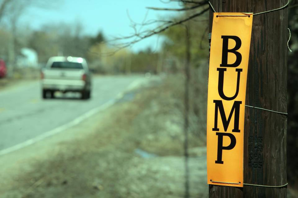 Gregory Rec/Staff Photographer -- Signs like this one warning motorists of bumps and frost heaves dot the utility poles along Route 24 in Bowdoinham. The road has been dubbed one of the worst in the state. Photo taken on Thursday, April 3, 2008. -- (Photo by Gregory Rec/Portland Press Herald via Getty Images)