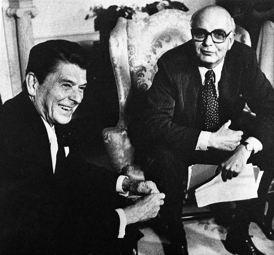 Federal Reserve Board chairman Mr. Paul Volcker, right, meets with President Ronald Reagan in the Oval Office in Washington D.C. on July 16, 1981. Volcker briefed a Congressional Committee earlier on President Reagan's trip to Canada the following week. (AP Photo/Applewhite)