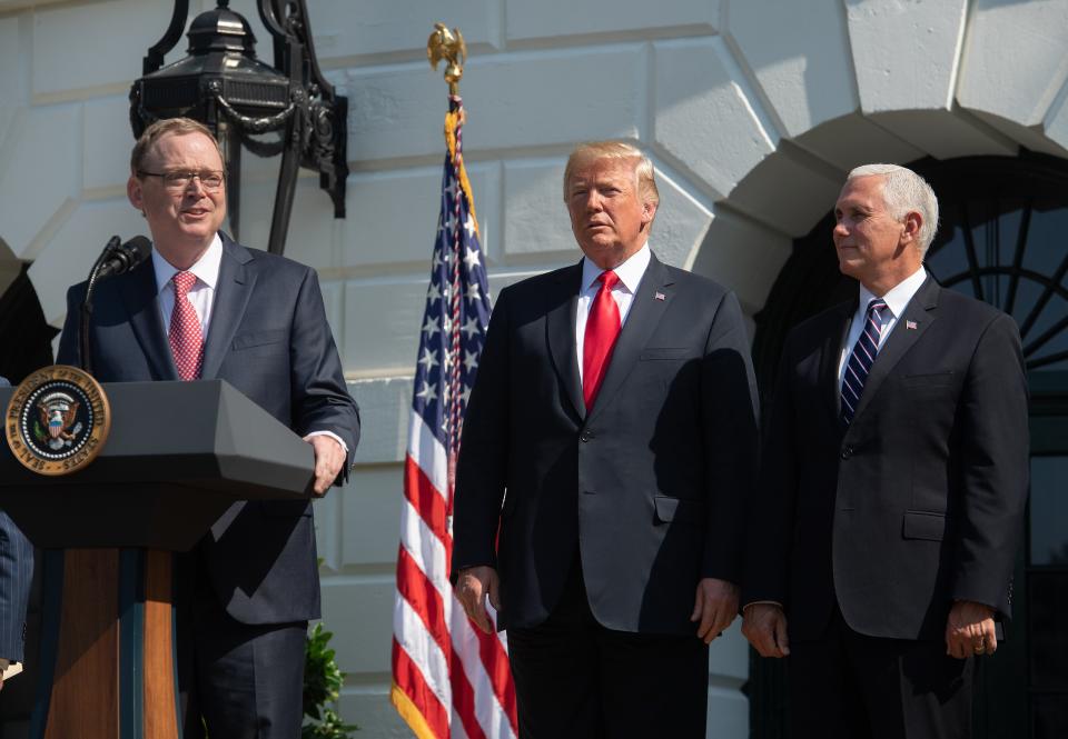 Kevin Hassett, Chair of the Council of Economic Advisers, speaks about the economy as US President Donald Trump (C) and Vice President Mike Pence (R) look on at the White House in Washington, DC, on July 27, 2018. - The US economy roared to life in the second quarter, posting the fastest annual growth rate in almost four years and the strongest among industrialized nations, according to government data released Friday. (Photo by NICHOLAS KAMM / AFP) (Photo by NICHOLAS KAMM/AFP via Getty Images)
