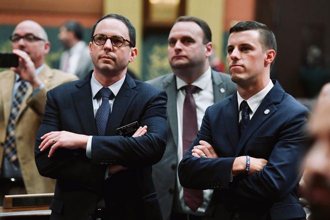 Rob Minard, left, was Michigan House Speaker Lee Chatfield's chief of staff in 2019 and 2020 when Chatfield was the House's top leader. Chatfield left office at the end of 2020 because of legislative term limits. In December, Attorney General Dana Nessel's office charged Minard and his wife, Anne, with embezzlement for allegedly financially exploiting and defrauding Chatfield's political fundraising accounts through a pattern of improper reimbursements, double billings and falsified records.