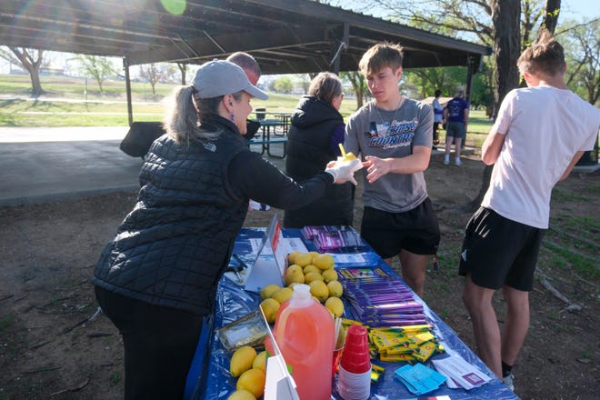 Attendees enjoy a fresh lemon drink at the Annual Epilepsy Foundation Walk Saturday at Thompson Park in Amarillo.