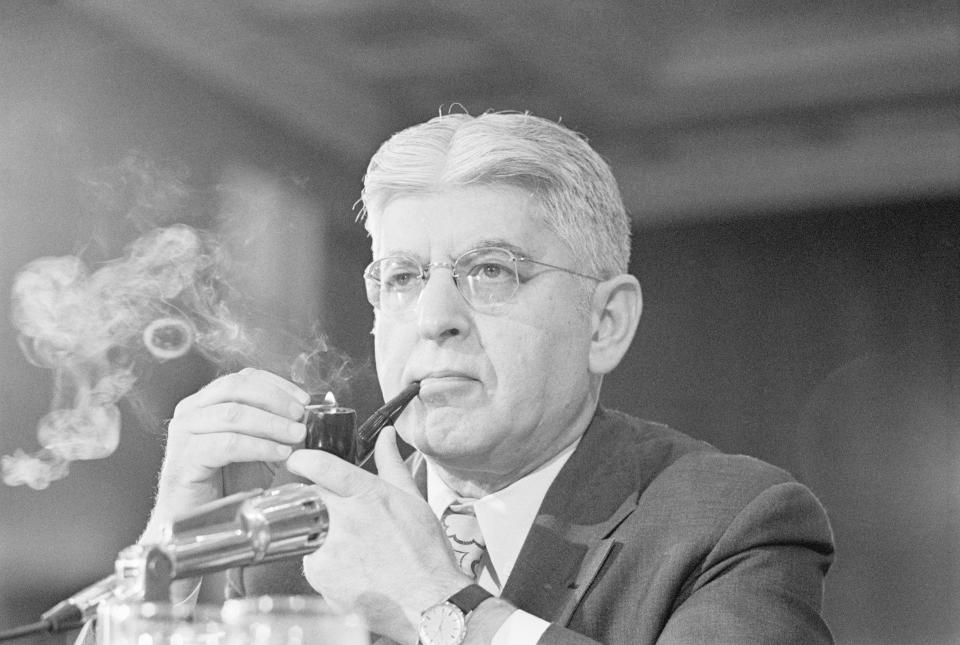 (Original Caption) 7/26/1972-Washington, D.C. Appearing before the Joint Economic Committee, Arthur Burns, chairman of the Federal Reserve Board, said inflation again threatens to run rampant and called on the pay board to crack down on the pay raises permitted U.S. workers. Burns proposed that the pay board abandon its guideline permitting pay increases of 5.5. per cent in favor of a lower guideline.