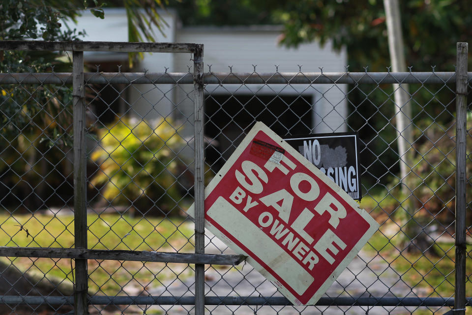 MIAMI - FEBRUARY 11:  A for sale sign is seen in front of a home on February 11, 2011 in Miami, Florida. Today, the Obama administration revealed plans to reform the government-controlled mortgage buyers Fannie Mae and Freddie Mac, which included winding down some of their programs that help home buyers.  (Photo by Joe Raedle/Getty Images)