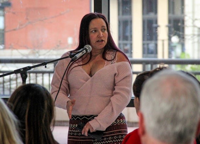 Niki Fontaine, Fall River's director of Substance Use and Homeless Outreach Services, asks questions at a public meeting of the Fall River Opioid Settlement Funds Advisory Committee on Wednesday, May 1, 2024 at Government Center.