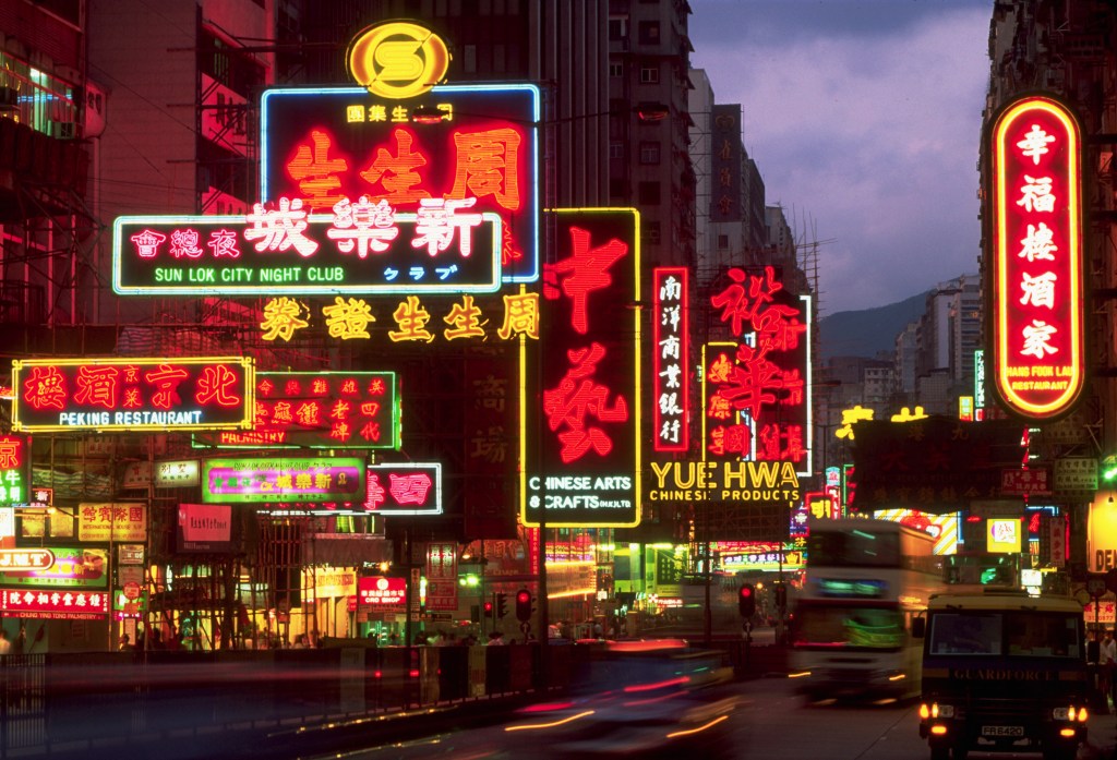Neon signs line Nathan Road in Kowloon, Hong Kong.