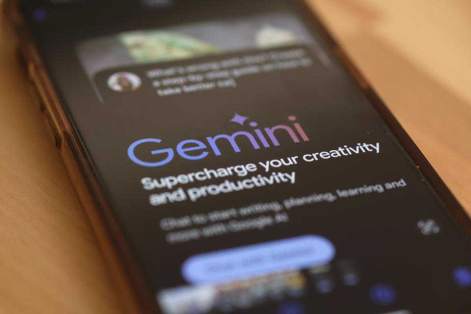 NEW YORK, NEW YORK - MARCH 18: In this photo illustration, Gemini Ai is seen on a phone on March 18, 2024 in New York City. Apple announced that they're exploring a partnership with Google to license the Gemini AI-powered features on iPhones with iOS updates later this year. Google already has a deal in place with Apple to be the preferred search engine provider on iPhones for the Safari browser. (Photo Illustration by Michael M. Santiago/Getty Images)