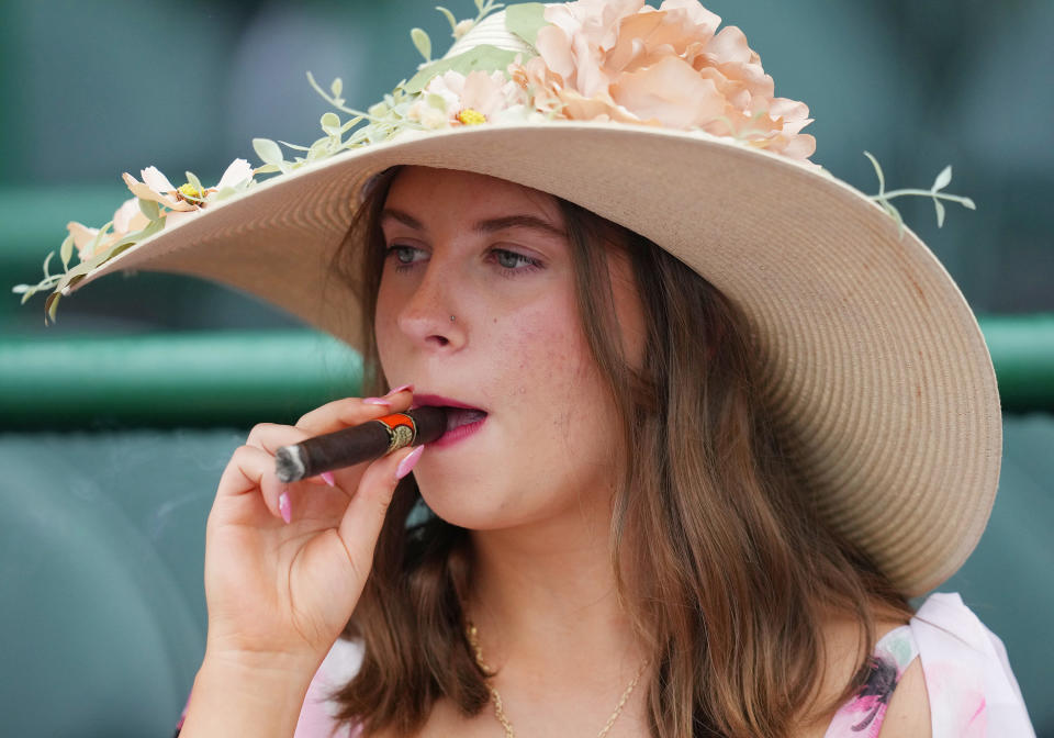 LOUISVILLE, KY - MAY 03: Fans show off their fashions and hats at the 150th running of the Kentucky Oaks on May 3, 2024, at Churchill Downs in Louisville, Ky. (Photo by Jeff Moreland/Icon Sportswire via Getty Images)