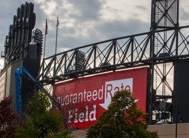 A sign is installed at the White Sox baseball stadium in Oct. 2016 to proclaim its new name: Guaranteed Rate Field. (Zbigniew Bzdak/Chicago Tribune).