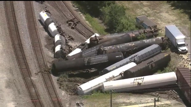 Train cars are piled up after a derailment on June 27, 2024 in Matteson. Emergency officials ordered an evacuation. No injuries have been reported.  (WLS via AP)