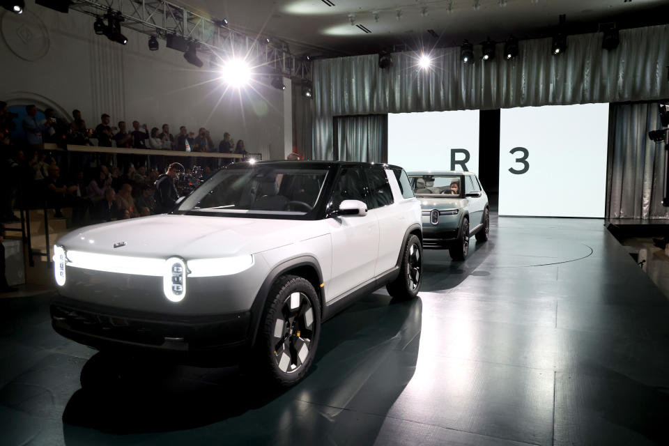 LAGUNA BEACH, CALIFORNIA - MARCH 07: The Rivian R3 SUV is displayed during the Rivian Reveals All-Electric R2 Midsize SUV event at Rivian South Coast Theater on March 07, 2024 in Laguna Beach, California. (Photo by Phillip Faraone/Getty Images for Rivian)
