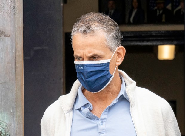 Jonathan Kaye is pictured in police custody leaving the NYPD 78th Precinct stationhouse in Brooklyn on Monday, July 1, 2024. (Theodore Parisienne for New York Daily News)