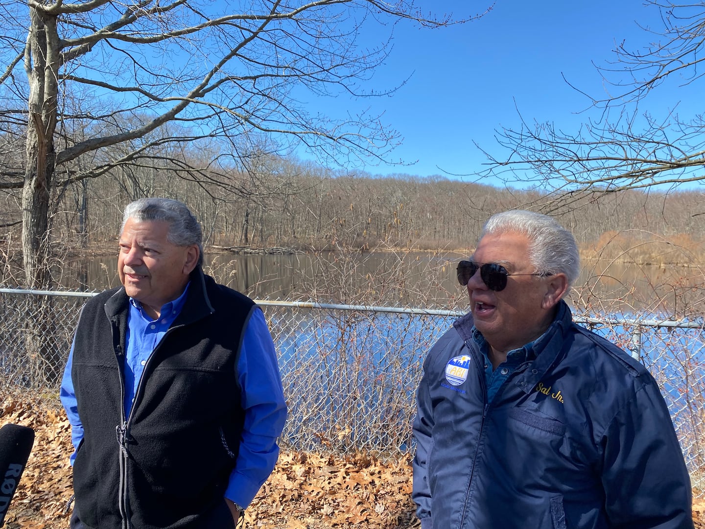 Property owners Ralph Santoro (left) and Salvatore Compagnone spoke to reporters on Wednesday at a 31-acre parcel on George Waterman Road in Johnston, R.I.