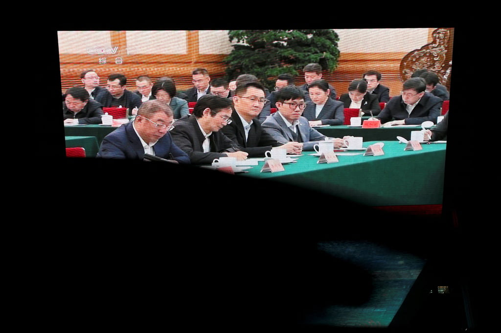 News footage of DeepSeek Founder Liang Wenfeng (right) with Tencent’s Pony Ma to his right attending a symposium on private enterprises on February 17, 2025. Photo: Reuters