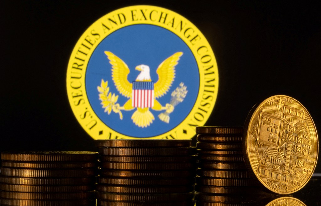 Illustration of U.S. Securities and Exchange Commission logo with representations of cryptocurrency.