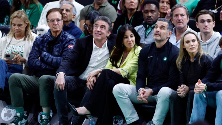 Boston Celtics co-owner Stephen Pagliuca (second from left), governor Wyc Grousbeck (third from left), and new majority owner Bill Chisholm (fifth from left) watchduring the third quarter in game one of the NBA Eastern Conference playoffs against the Orlando Magic at TD Garden.