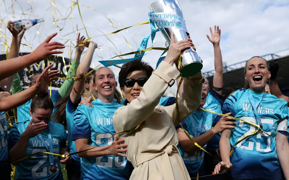 Michele Kang and London City Lionesses celebrate their promotion to the Women's Super League