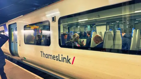 Getty Images A Thameslink train at London Gatwick railway station - stock photo