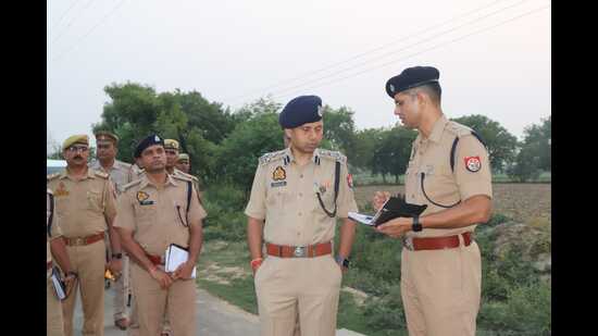 DIG Agra Range Shailesh Pandey and SSP Firozabad Saurabh Dixit at the spot of double murder in Firozabad. (HT Photo) DIG Agra Range Shailesh Pandey and SSP Firozabad Saurabh Dixit at the spot of double murder in Firozabad. (HT Photo)