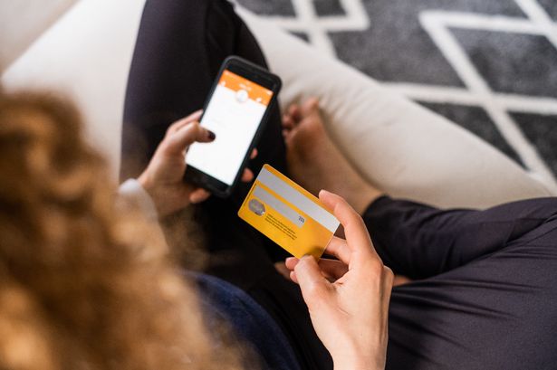 Using smartphone with payment mobile banking online.