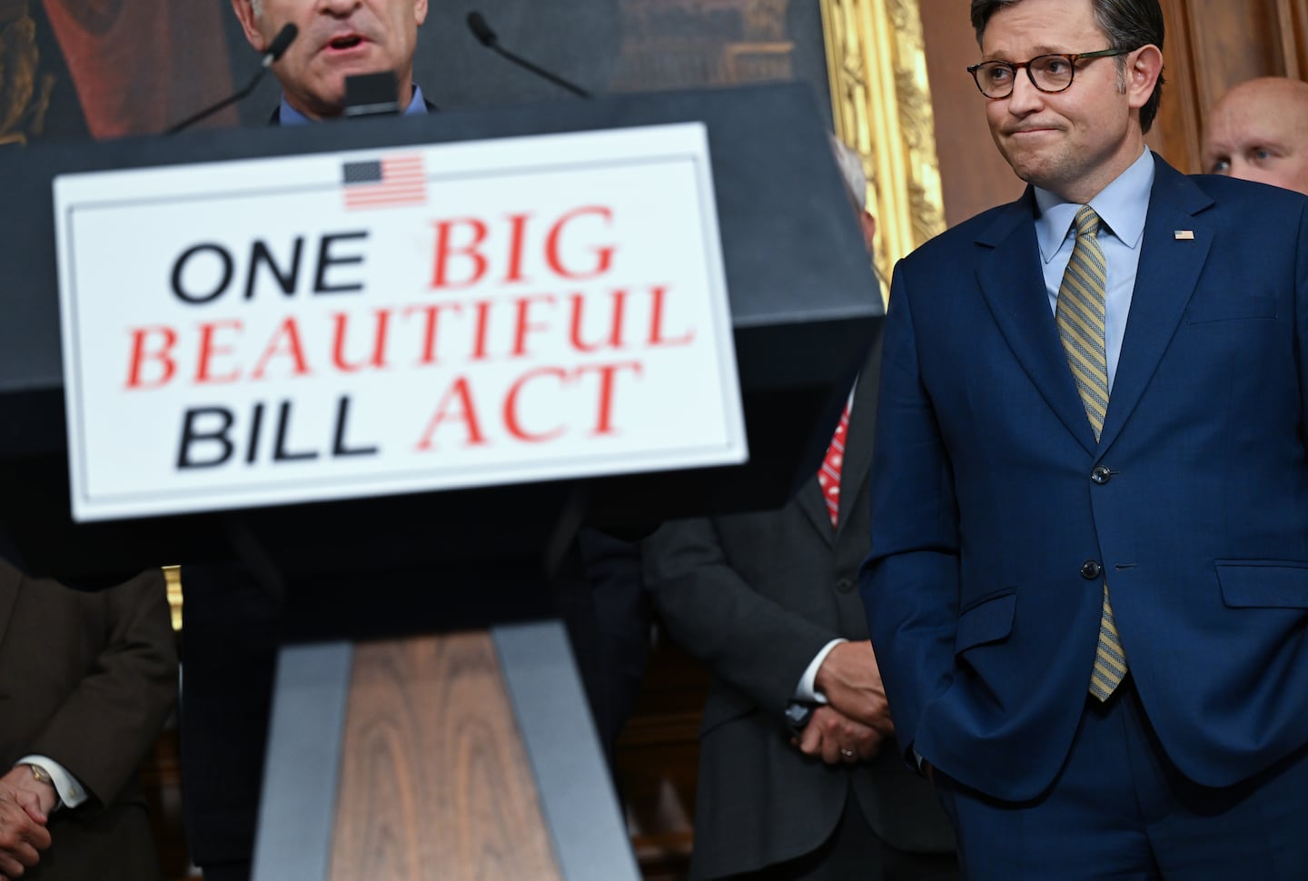 House Speaker Mike Johnson (R-Louisiana), right, listens as Rep. Mark Green (R-Tennessee) speaks at a news conference.