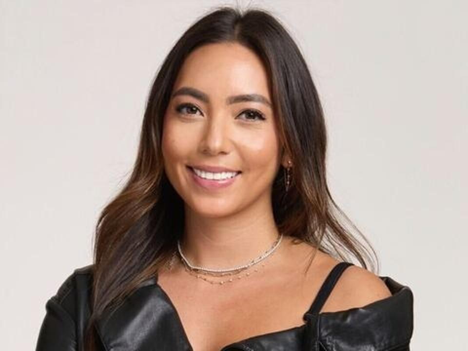Olivia Landau's headshot wearing a leather jacket