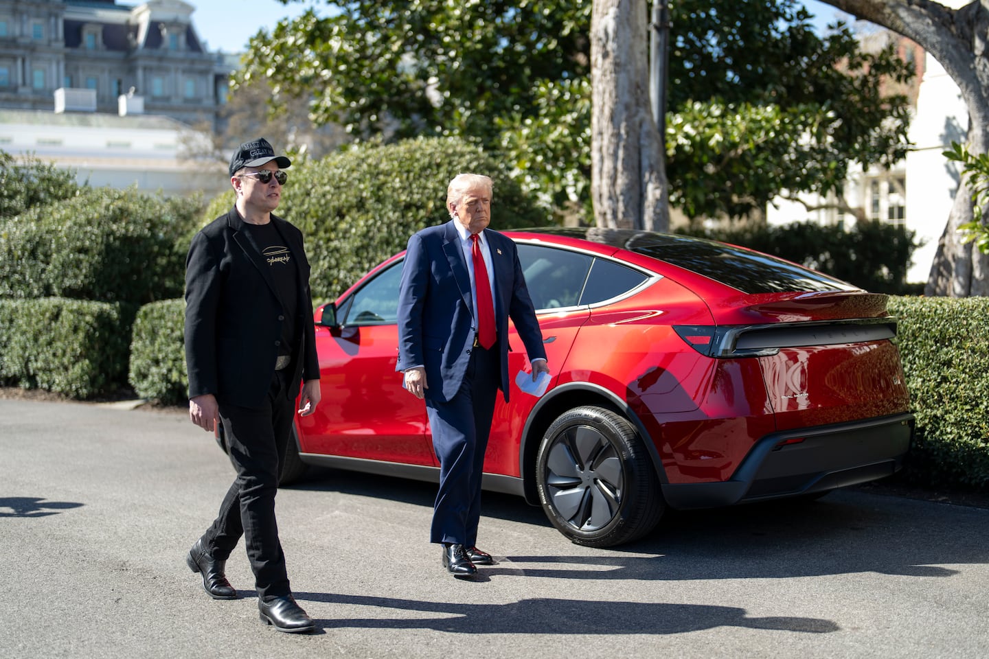 President Trump with Elon Musk as they look at new Tesla vehicles outside the White House in Washington, March 11, 2025. 