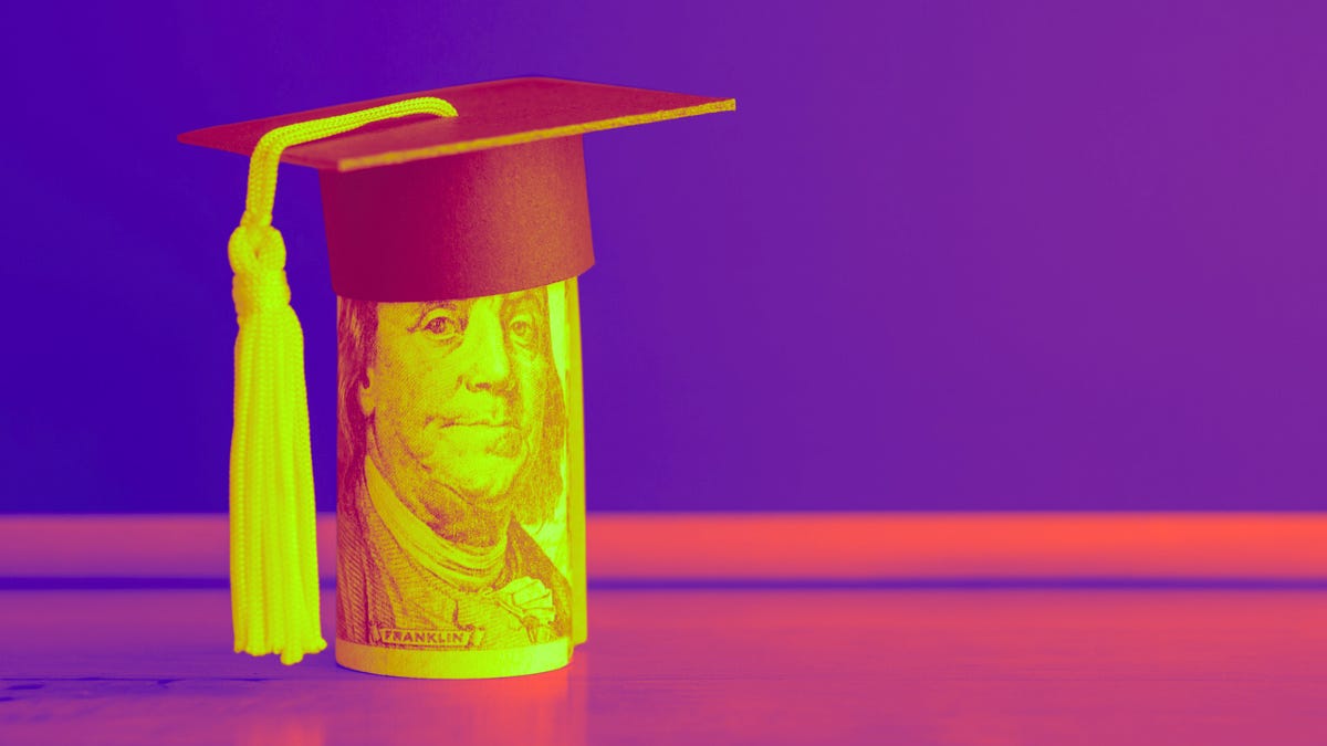 a dollar bill with a graduation cap in front of a purple background