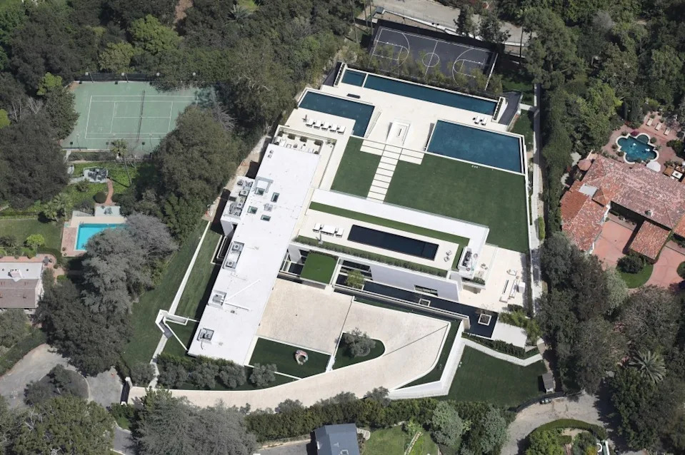 The property comes with four pools, a basketball court and a 15-car garage. Vasquez-Max Lopes / BACKGRID