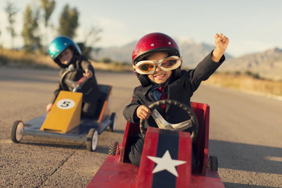 Young Business Boys Race Toy Cars