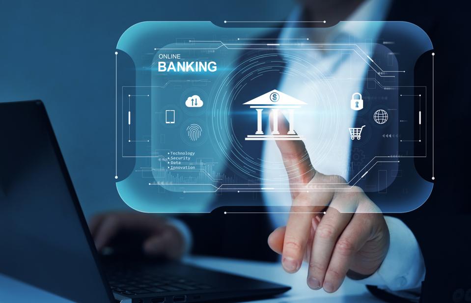 Businessman touching virtual screen  with icon online banking. Online payments, cyber security and devices concept. Digital innovation technology.