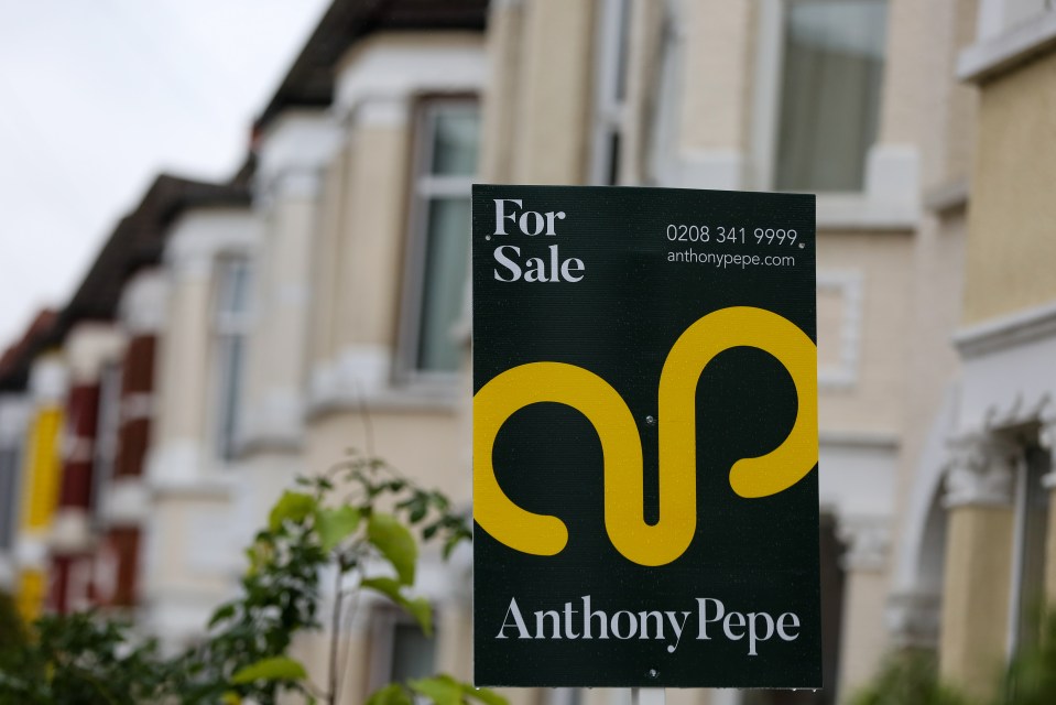 For Sale sign outside a London house.