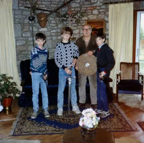 Jonathan Scott/Instagram The Scott twins and brother J.D. with a blacksmith.