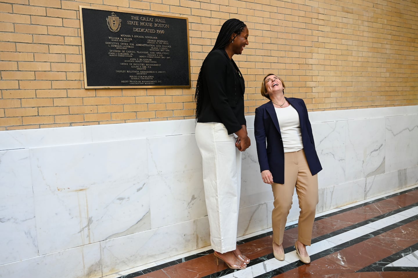 Governor Maura Healey (right) wasn't quite the inside presence as a basketball player that Aliyah Boston is in the WNBA.