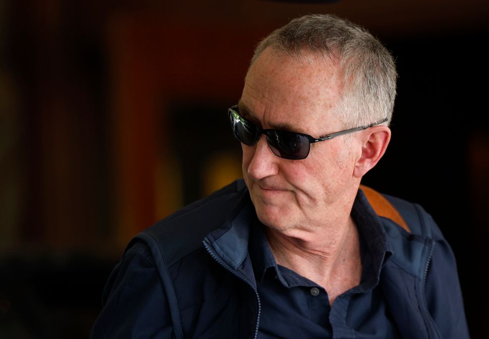 Man in black shirt and sunglasses