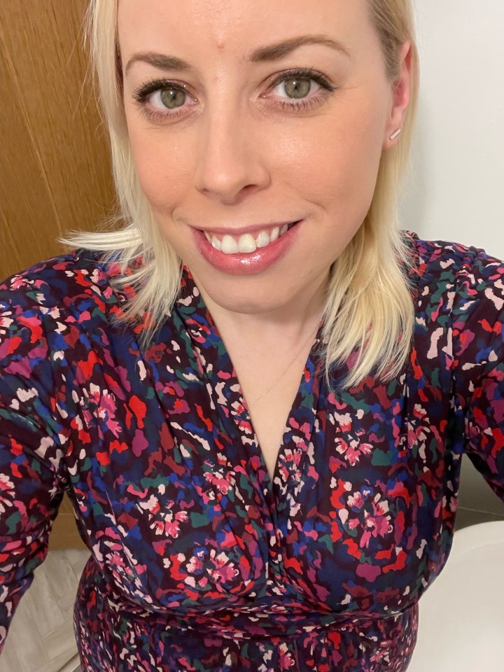 Woman in floral dress.