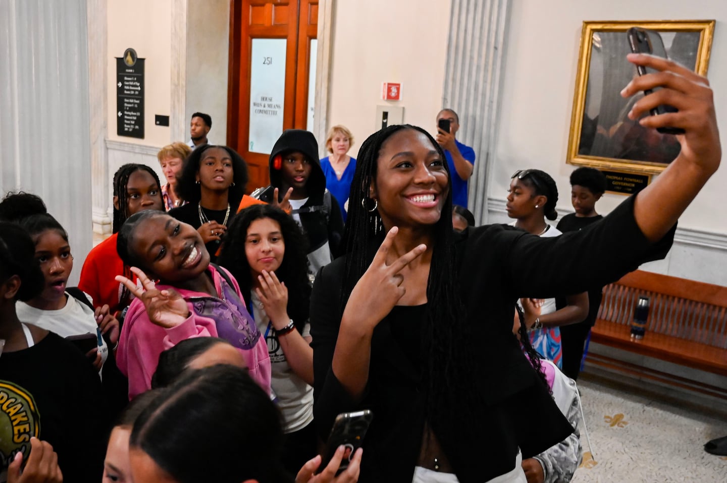 Aliyah Boston took time for some selfies with young fans at the State House.