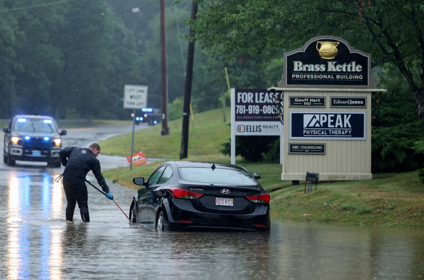 A vehicle was stranded in high water on Route 3A in Cohasset on July 10.
