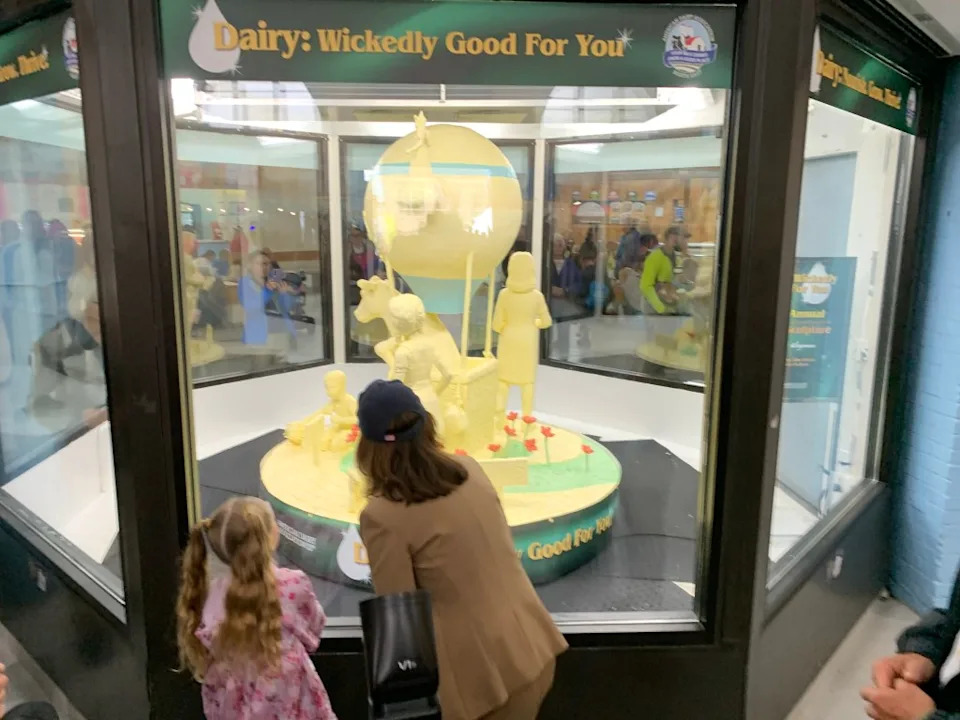 Hochul examining a butter sculpture at the fair. Vaughn Golden/NY Post