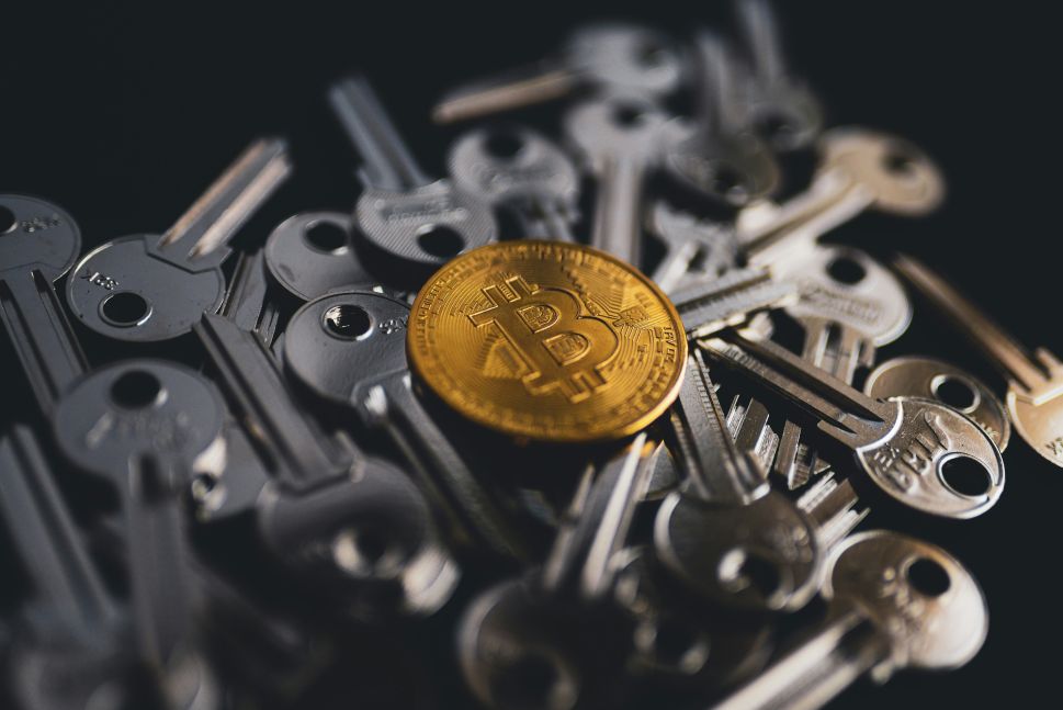 Bitcoin on top of a pile of keys